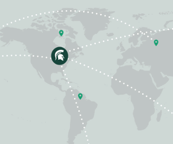 A graphic of a MSU Spartan helmet logo placed on the geographic location of Michigan, with lines stretching out from the logo and reaching across the map of the world. 